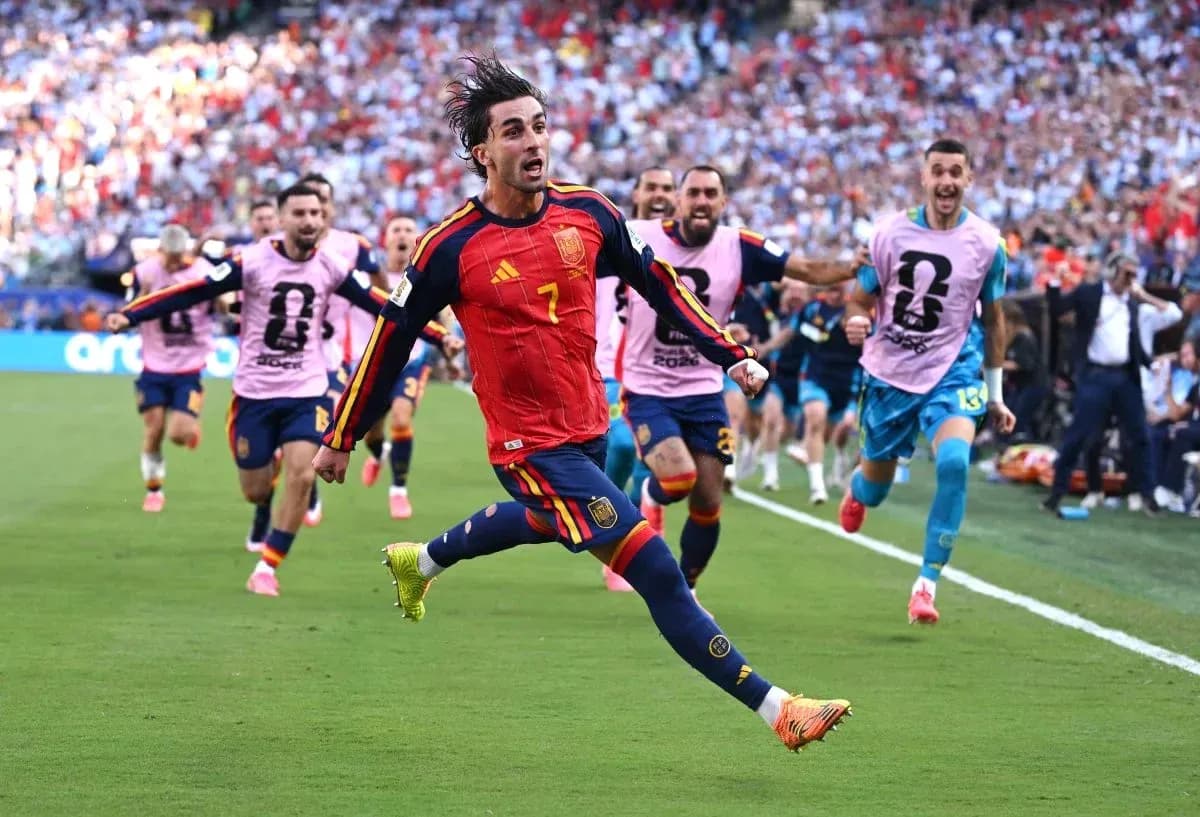 Player celebrating with teammates after scoring a goal