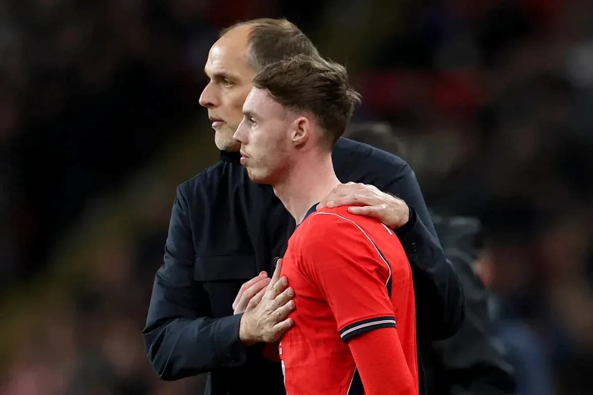 Coach speaking to player during match substitution