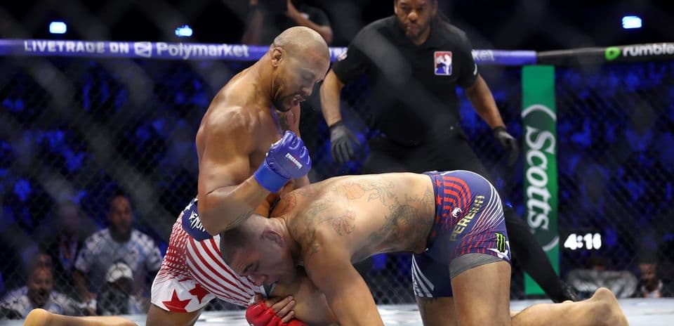 Fighter delivering a punch during MMA match