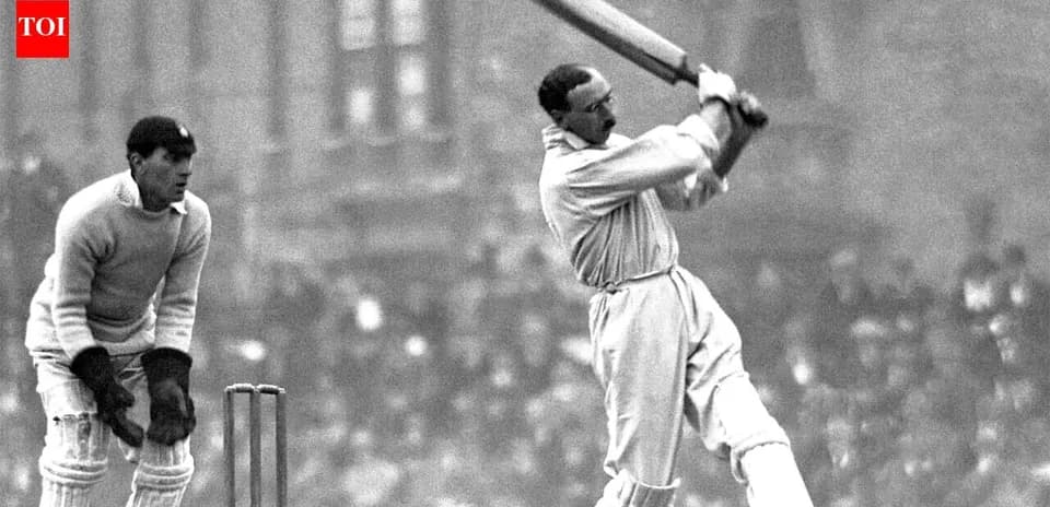 Batsman hitting ball with wicketkeeper behind
