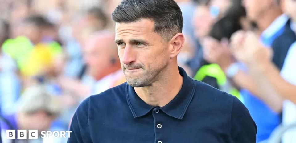 Manager walking on the sidelines during a match