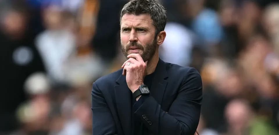 Manager contemplating during a football match