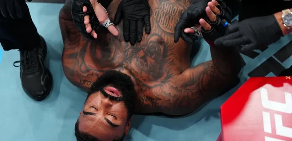 Fighter receiving medical attention in the ring