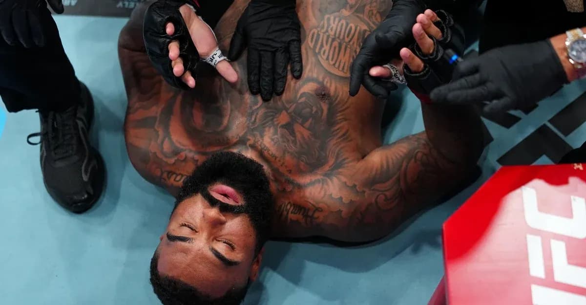 Fighter receiving medical attention in the ring