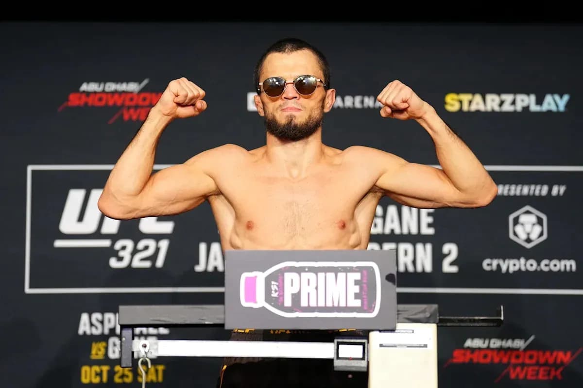 Fighter flexing muscles at UFC weigh-in event