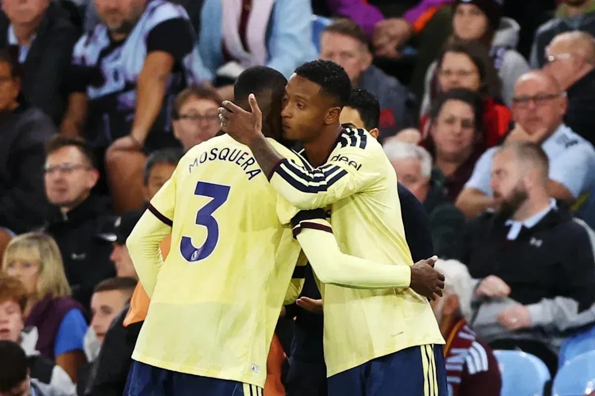 Two players embracing during a match celebration