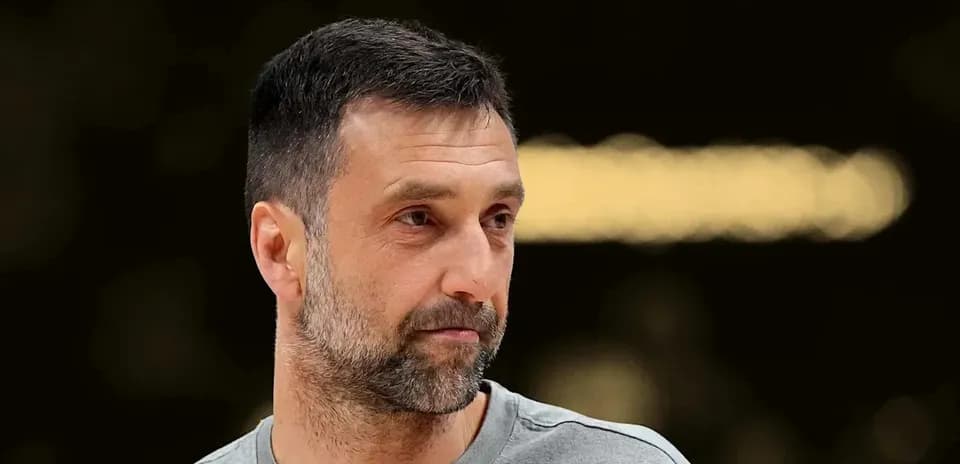 Coach observing during basketball training session