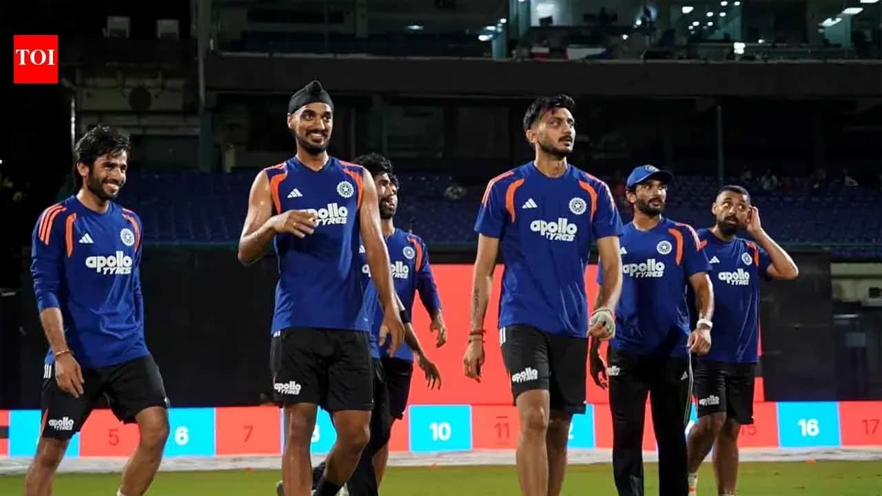 Cricket team walking off the field after practice