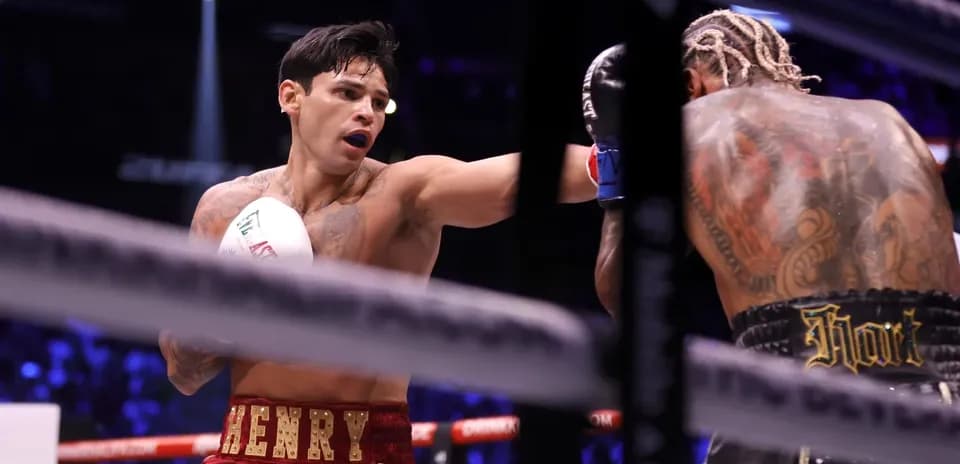 Boxer throwing a punch during a match