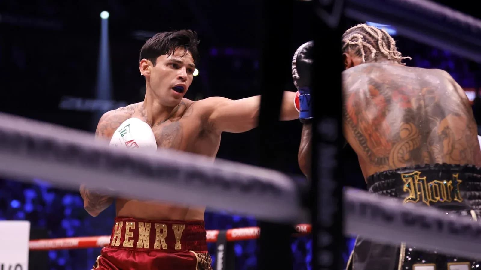 Boxer throwing a punch during a match