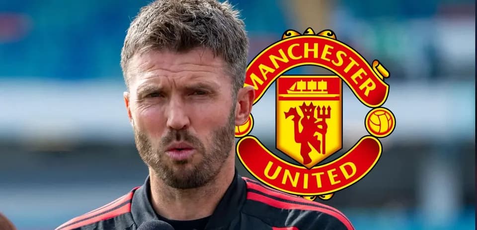Coach speaking at press conference with Manchester United logo