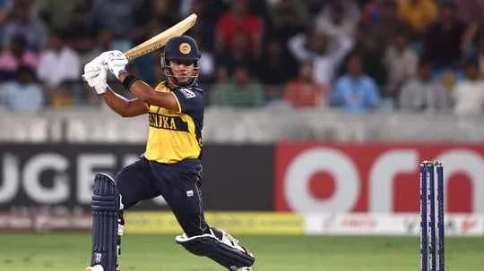 Batsman hitting a ball during a cricket match