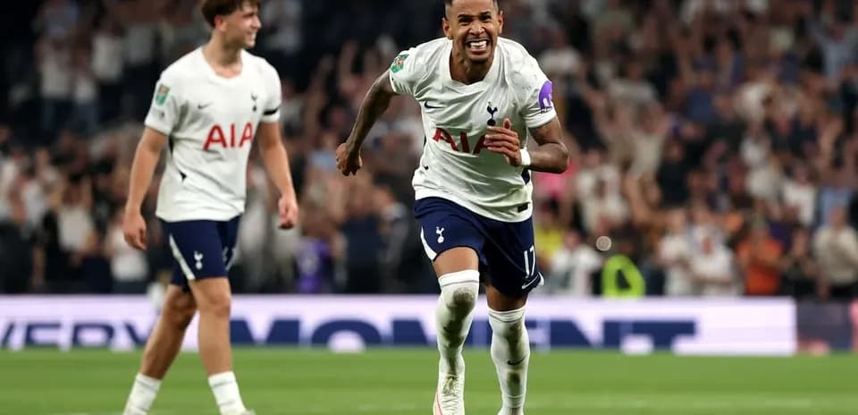 Tottenham player celebrating a goal on the pitch