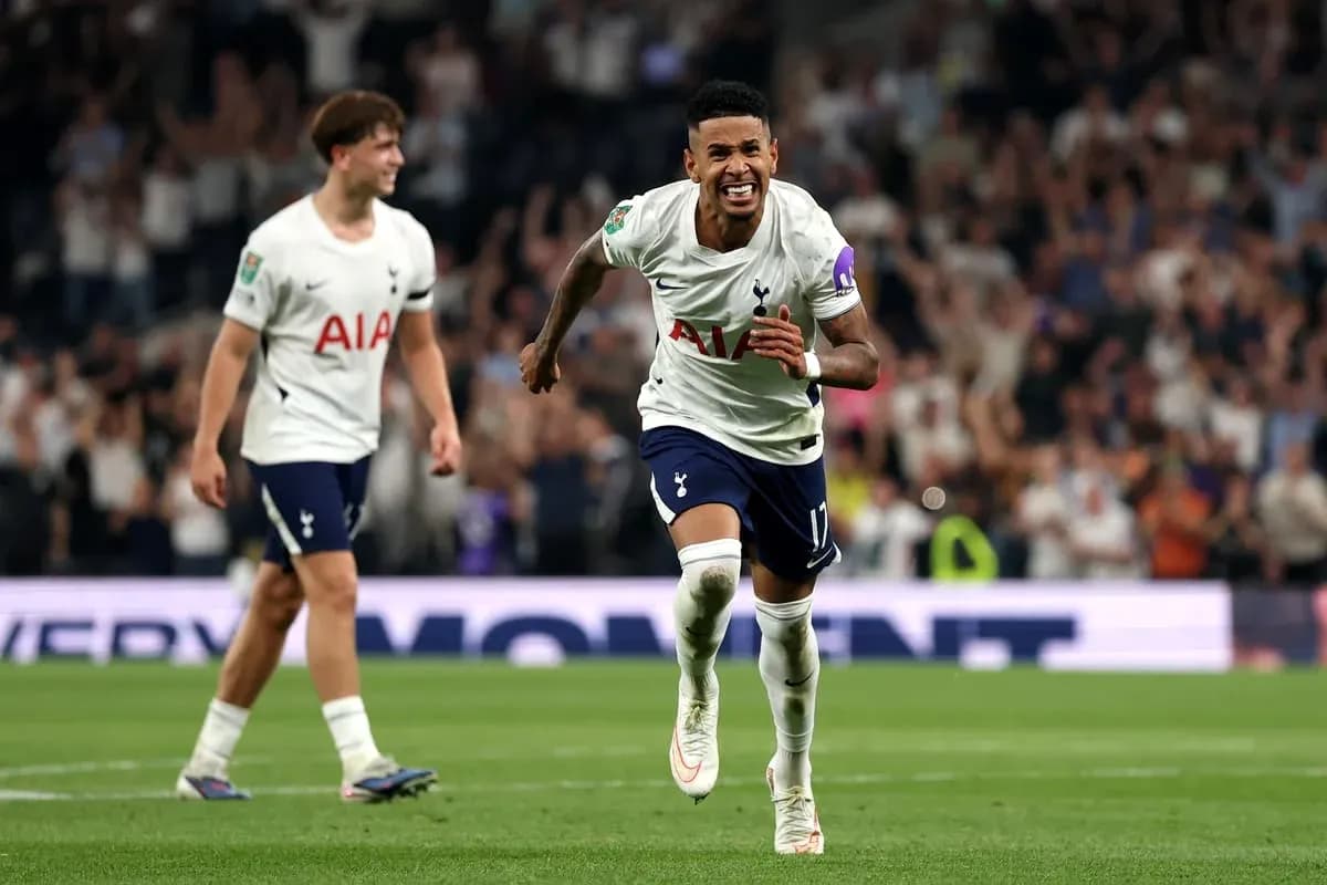 Tottenham player celebrating a goal on the pitch