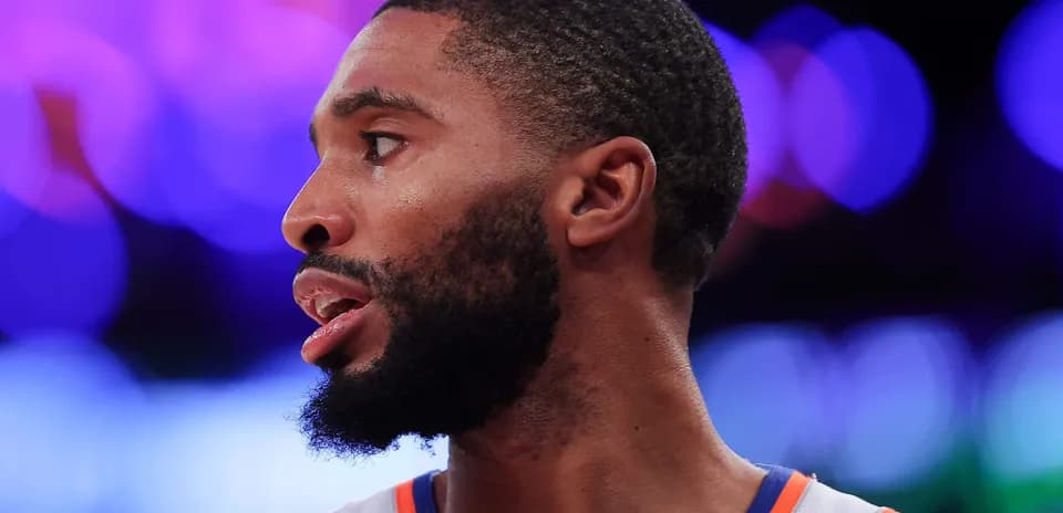 Basketball player in profile during game action