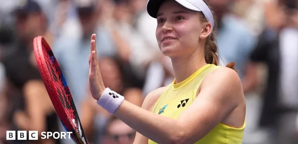 Tennis player waving with racket in hand
