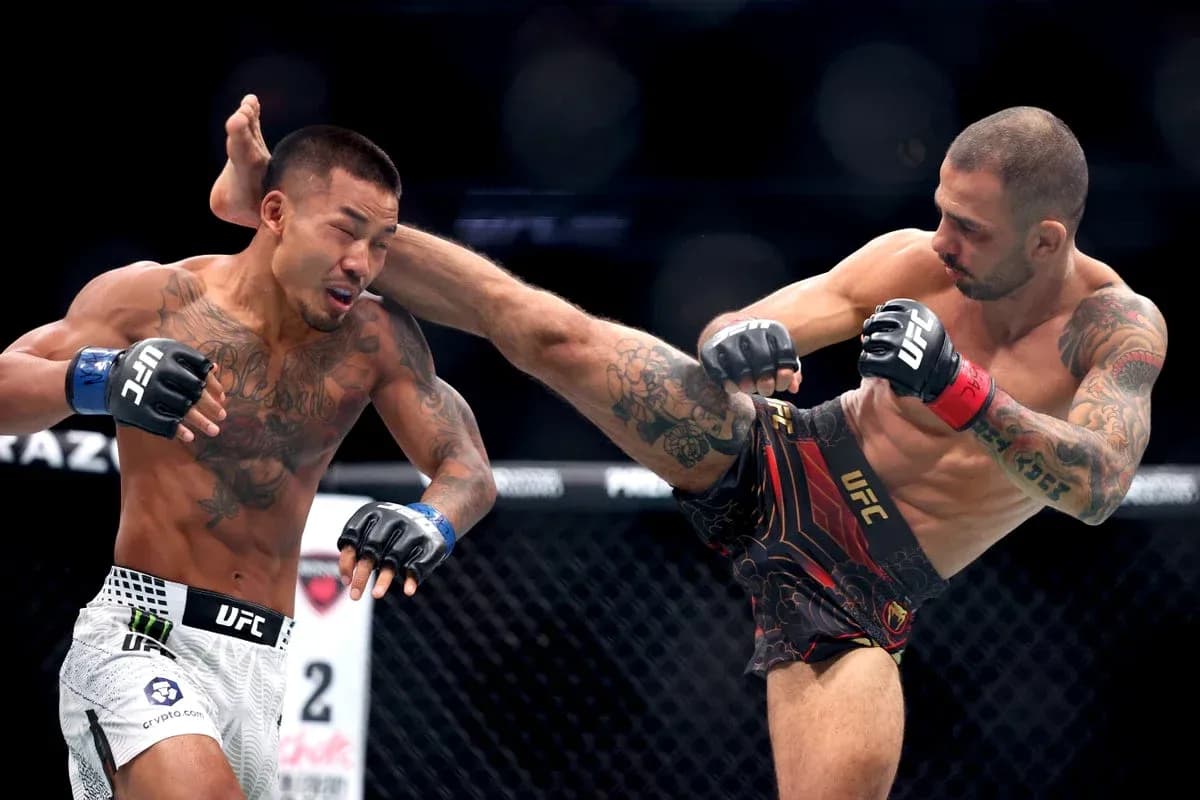 Two fighters exchanging strikes in UFC match