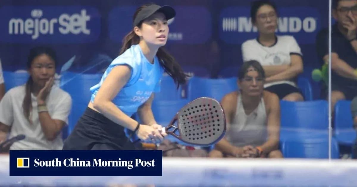 Female player preparing to hit a paddle ball