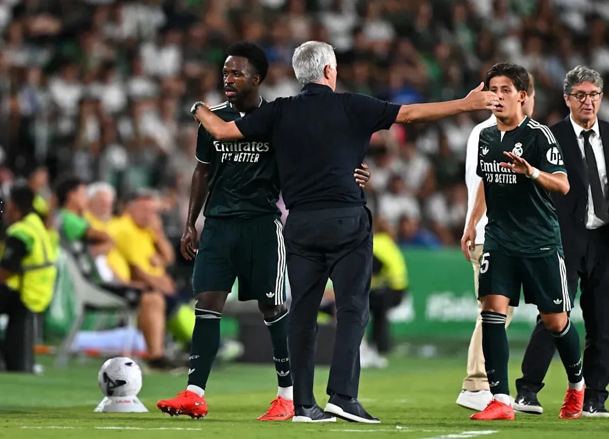 Coach instructing players during a match