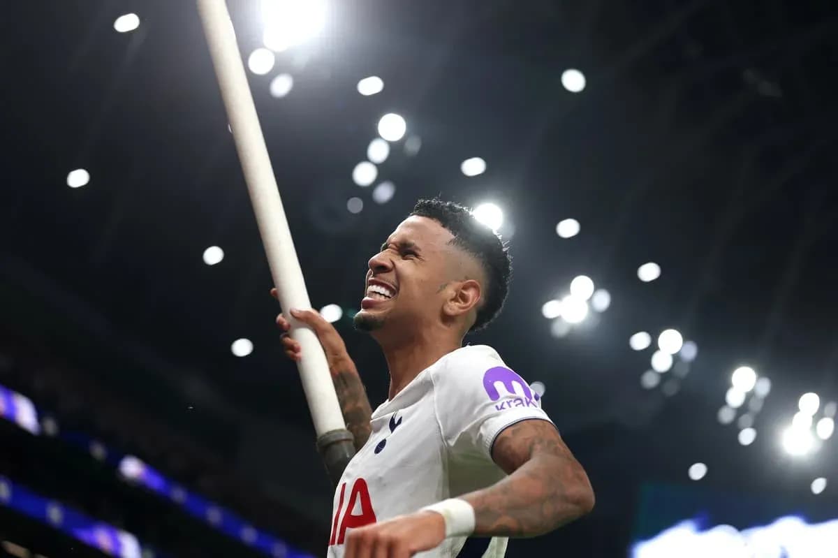 Player celebrating with a pole at stadium