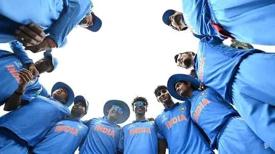 Indian cricket team huddled together before match