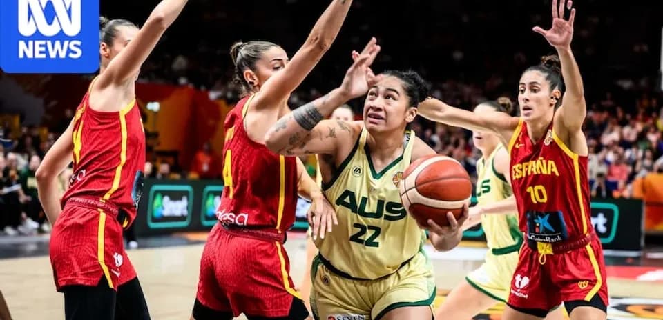 Player driving to the basket during Australia vs Spain game