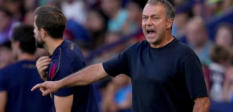 Coach gesturing and shouting during match on sidelines
