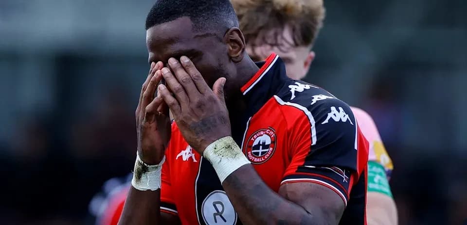 Player holding his face during a match