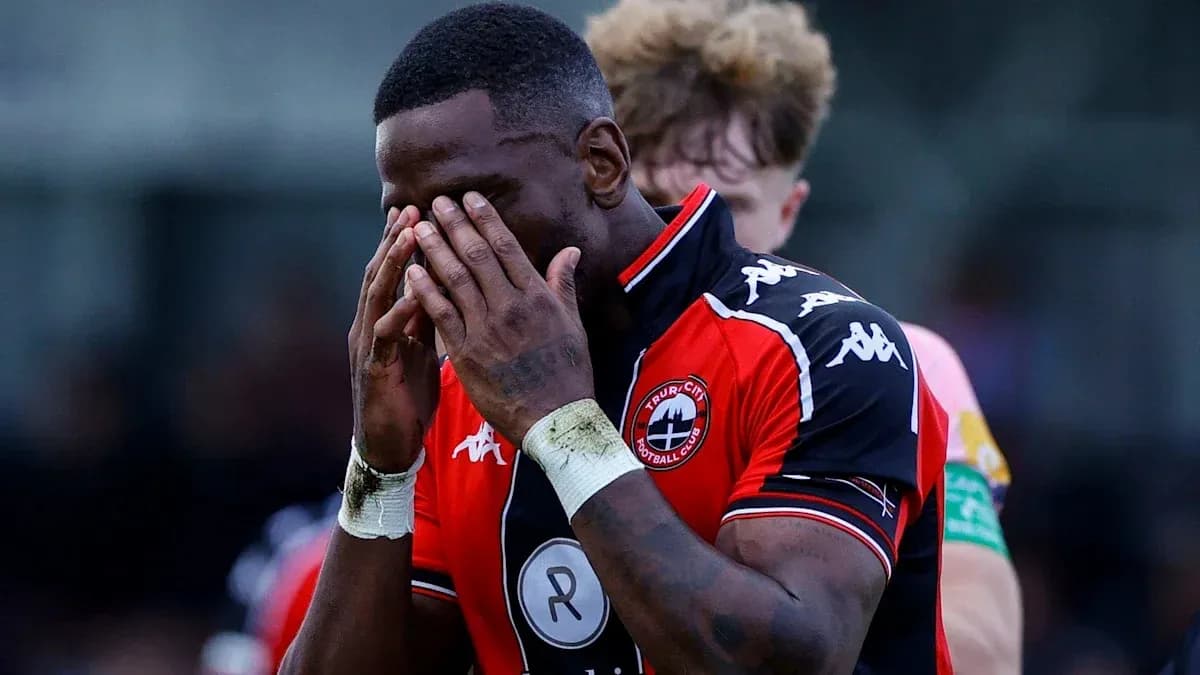 Player holding his face during a match