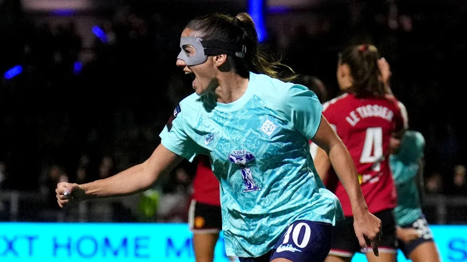 Player celebrating after scoring a goal in match