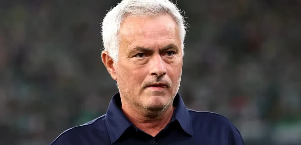 Manager focused during match on the sidelines