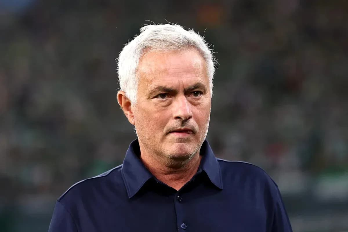 Manager focused during match on the sidelines
