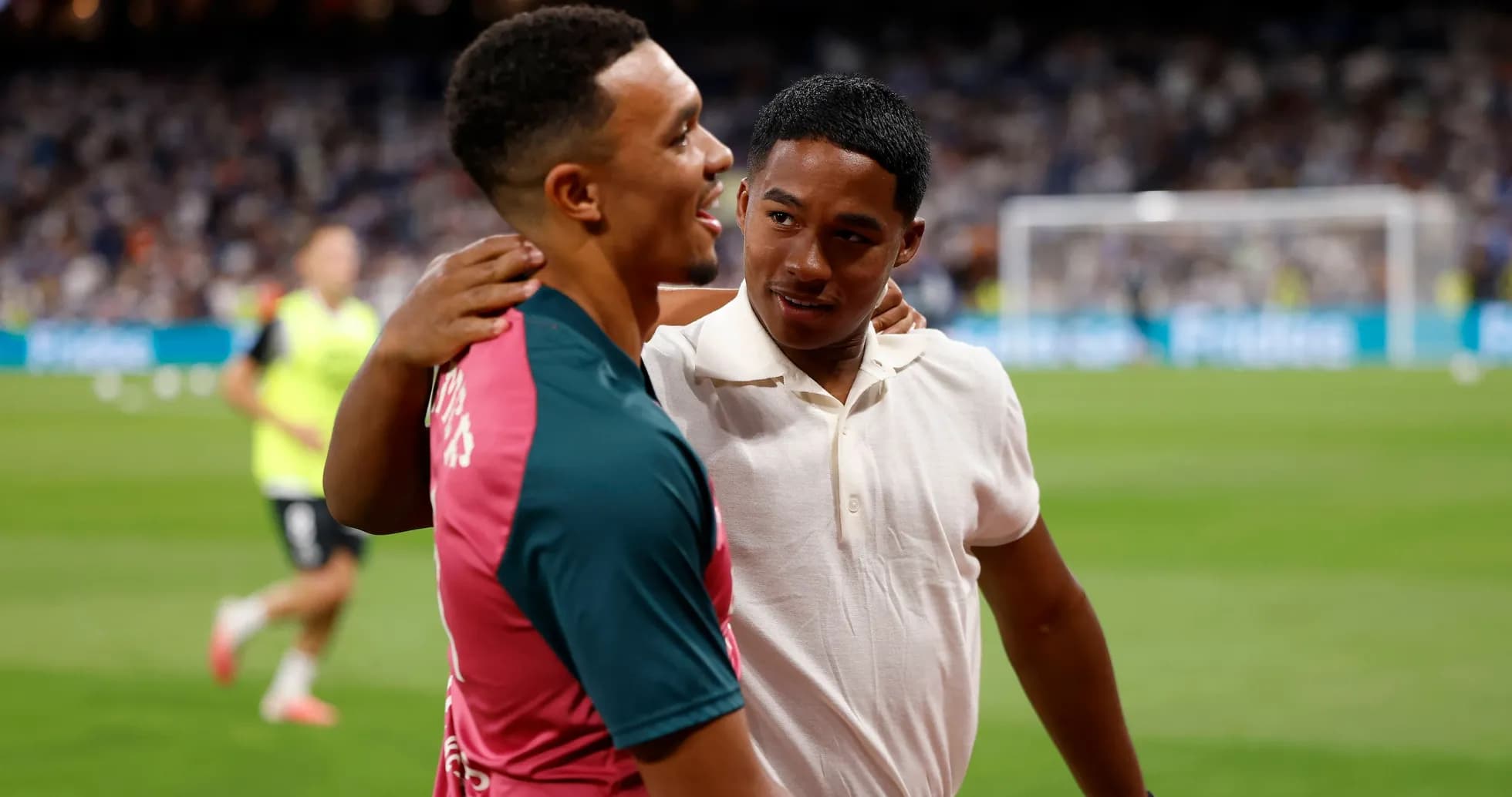 Two young men sharing a moment on the pitch