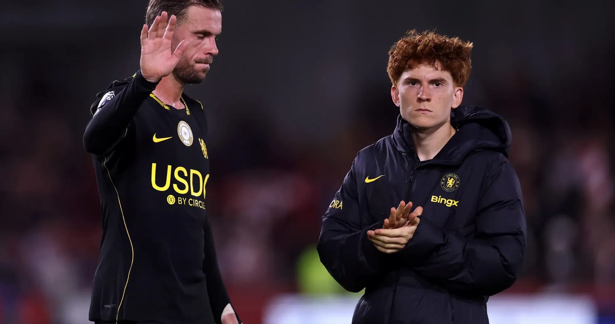 Players acknowledging fans after the match