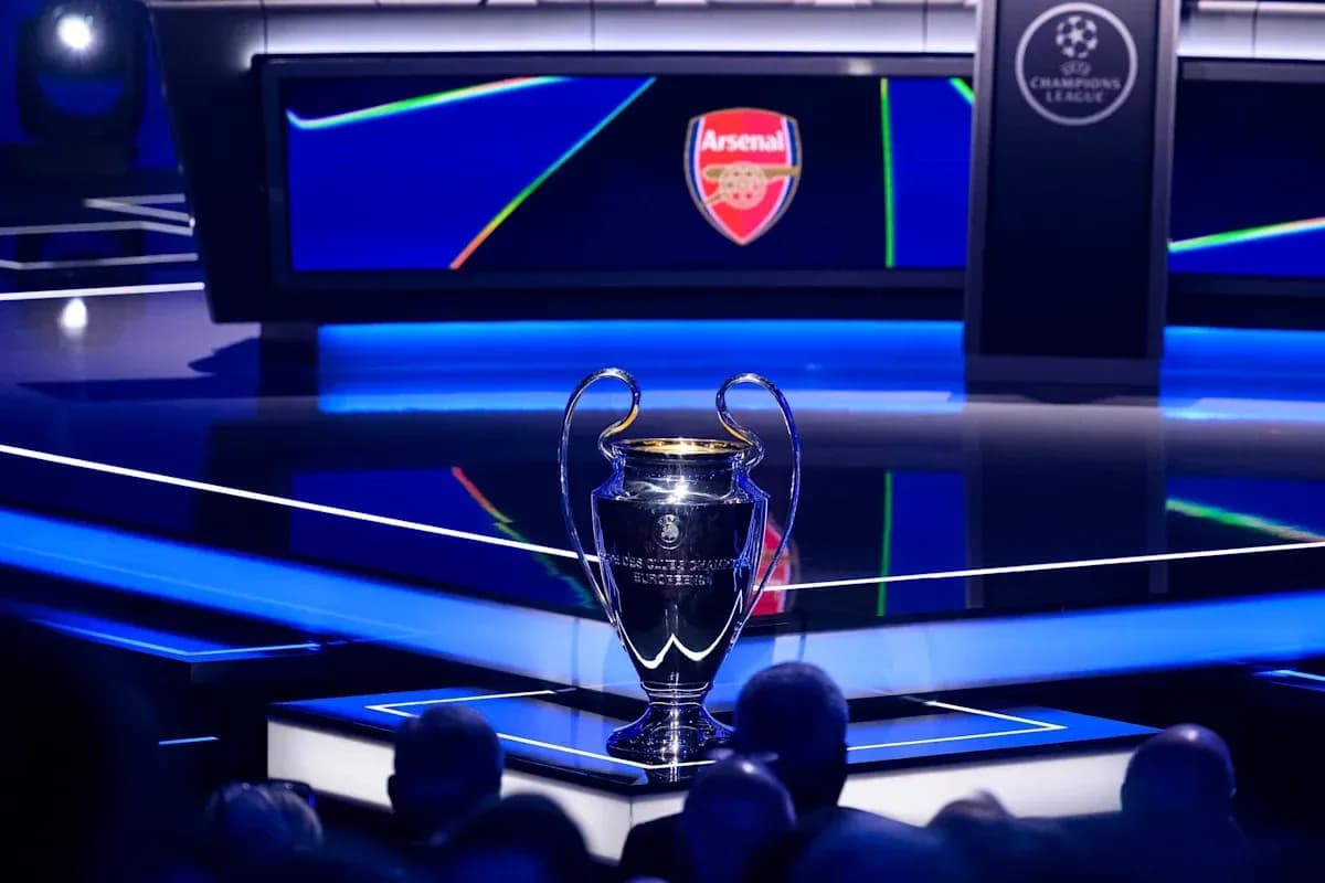 UEFA Champions League trophy displayed on stage