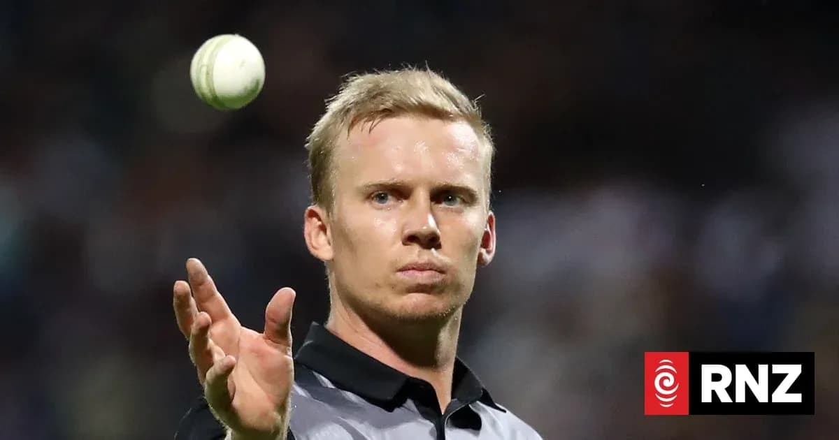 Umpire preparing to deliver a cricket ball