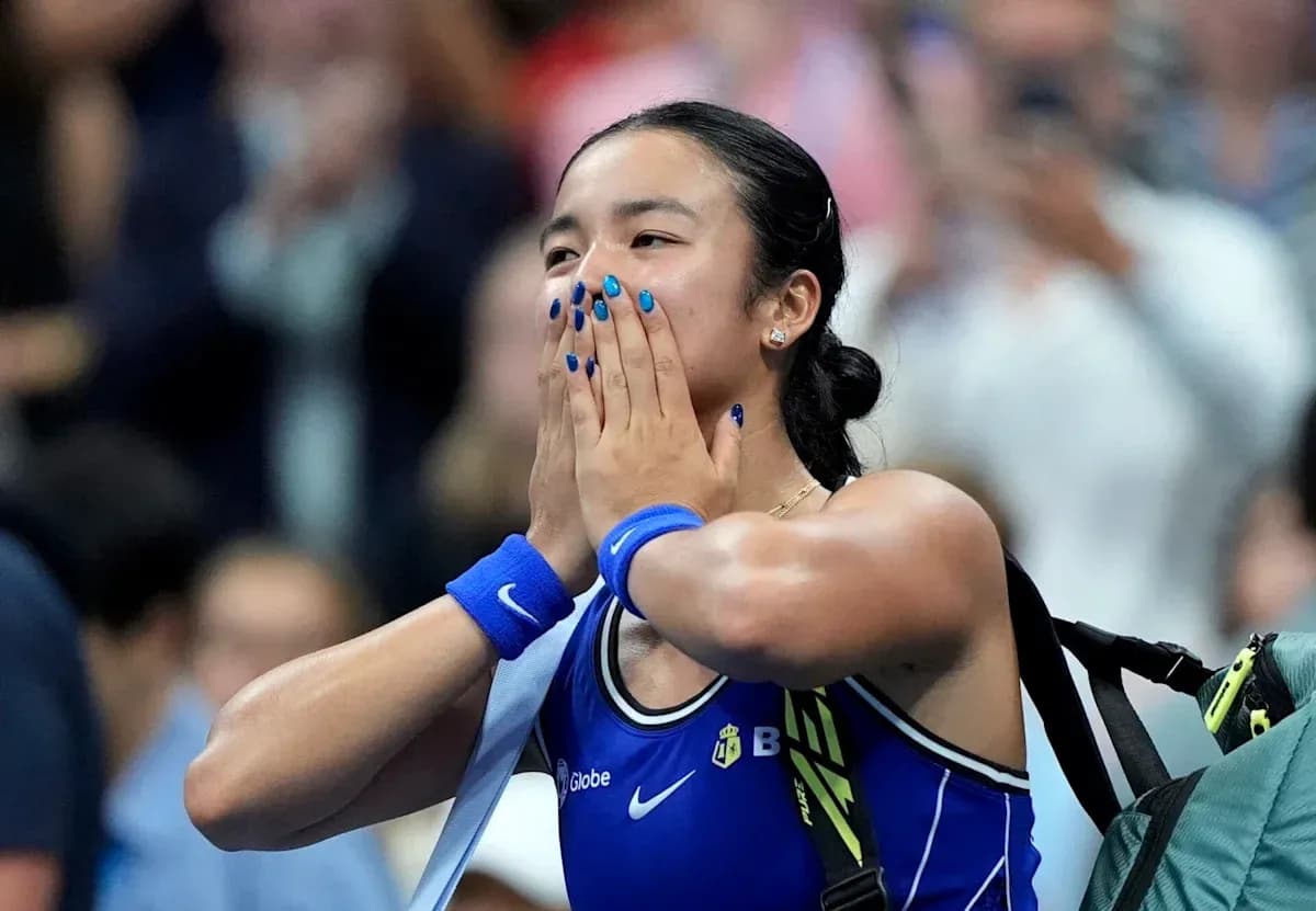 Tennis player celebrating victory with hands on face