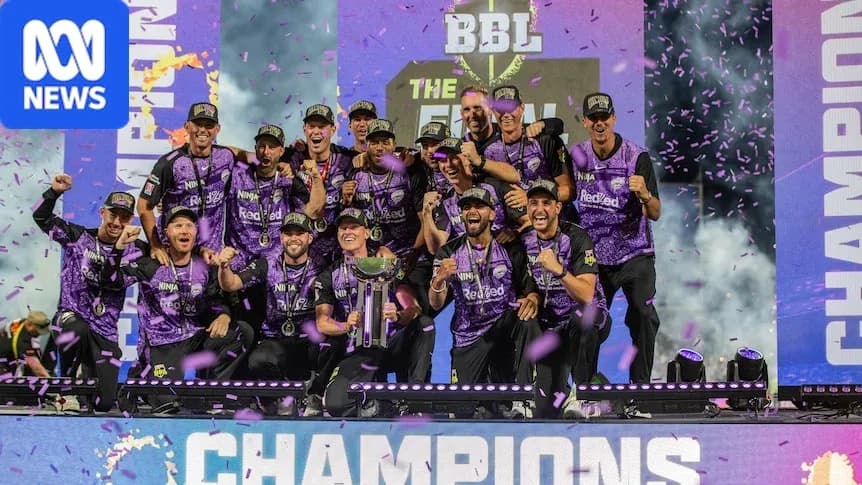 Cricket team celebrating championship victory on stage