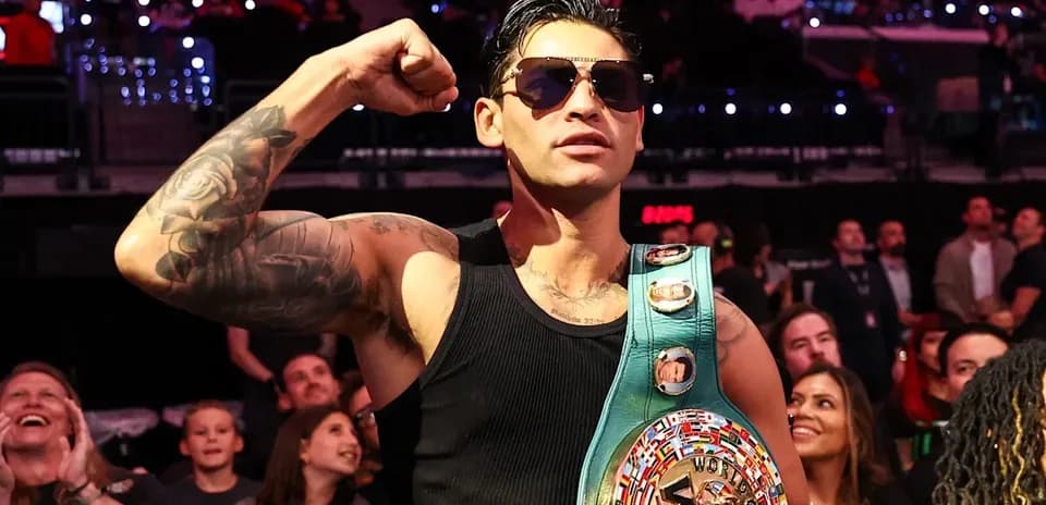 Boxer celebrating with WBC championship belt in crowd