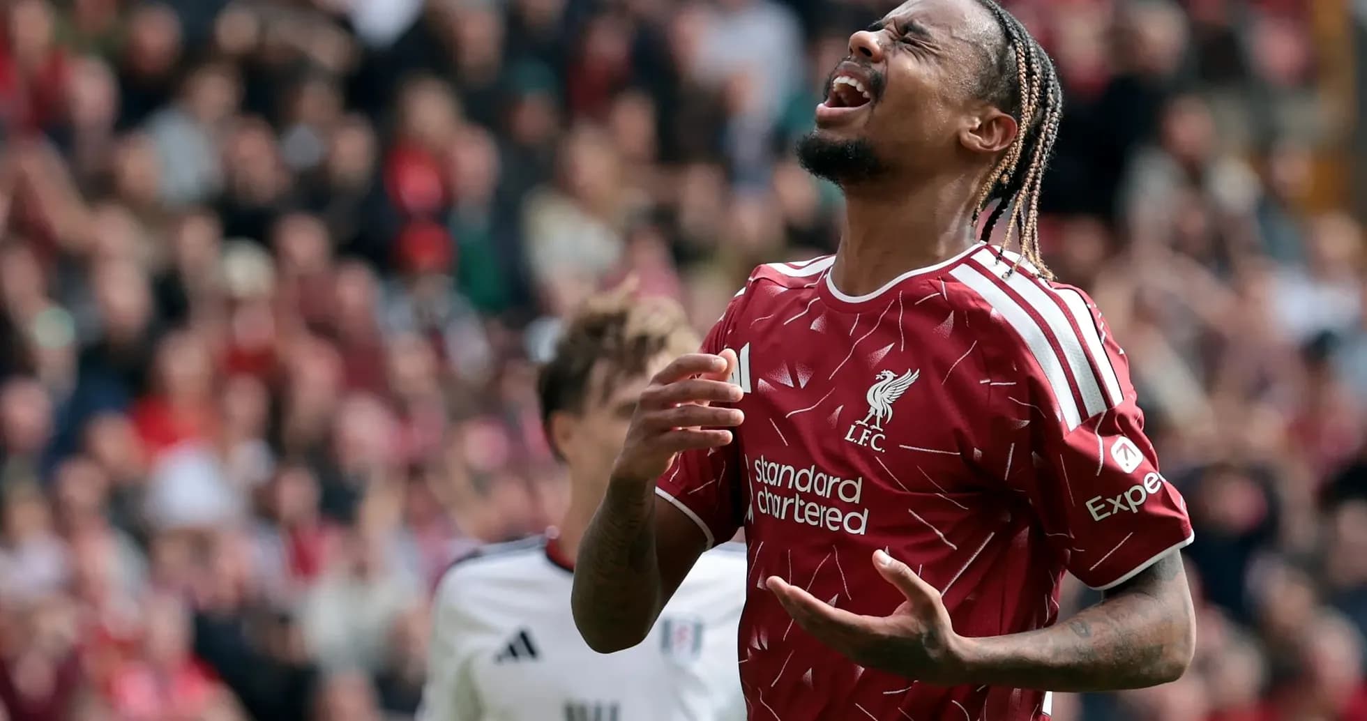 Liverpool player reacting during a match against Fulham