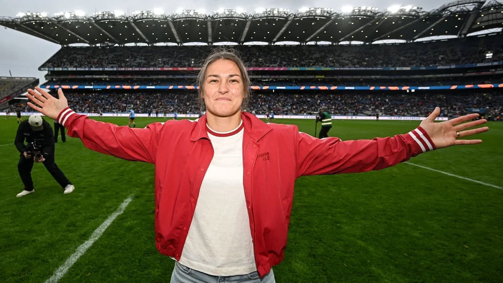 Player celebrating on the field with outstretched arms