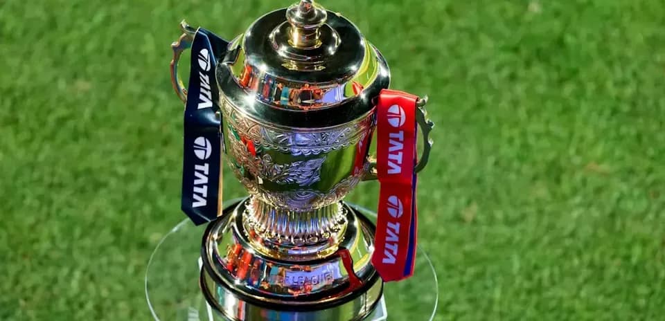 Trophy with ribbons displayed on glass pedestal