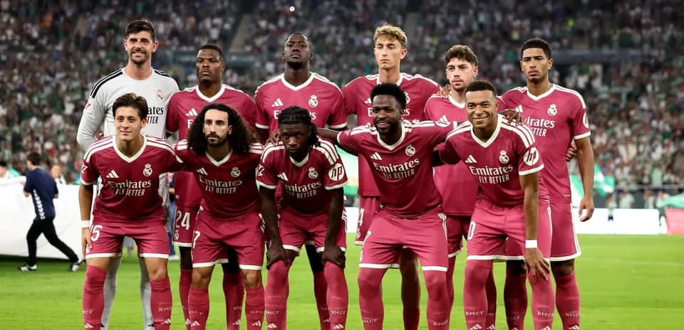 Real Madrid team posing for group photo before match