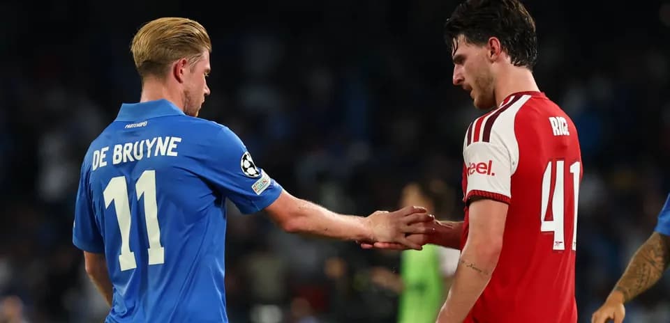De Bruyne and Rice shaking hands on the field