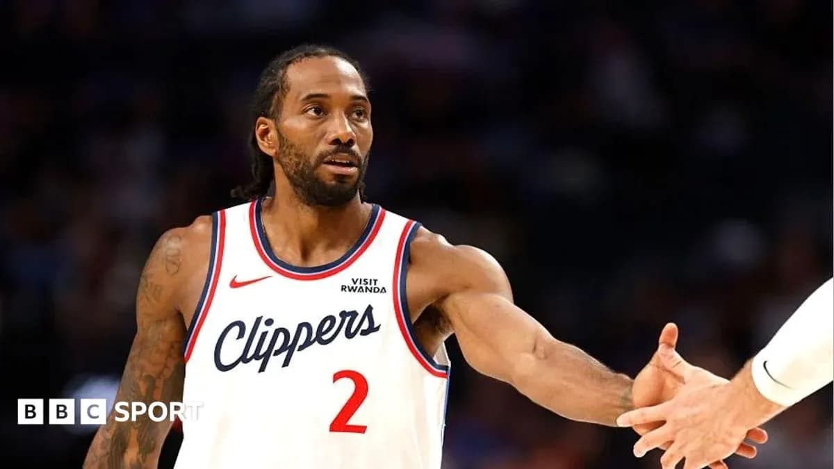 Player in Clippers jersey reaching for handshake