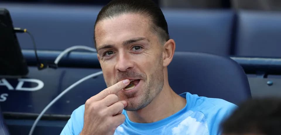 Player sitting on bench, eating during match