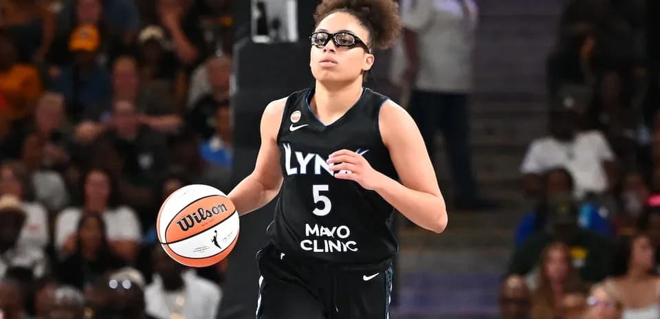 Player dribbling basketball during a game