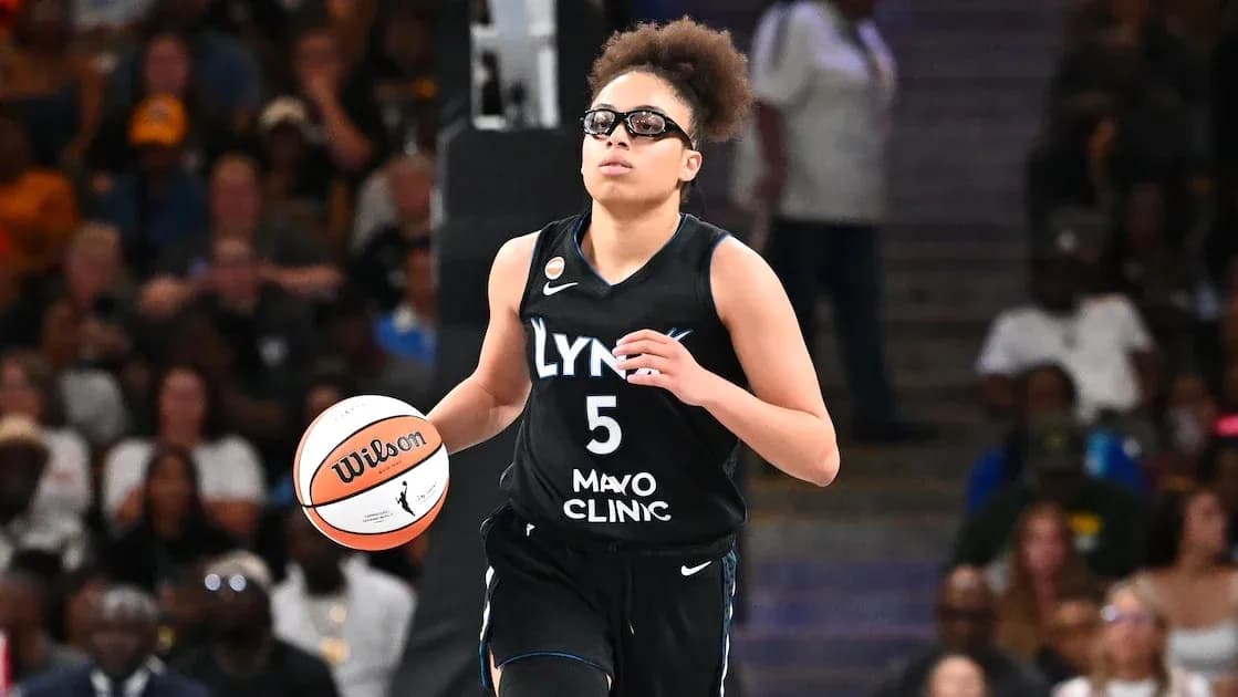 Player dribbling basketball during a game