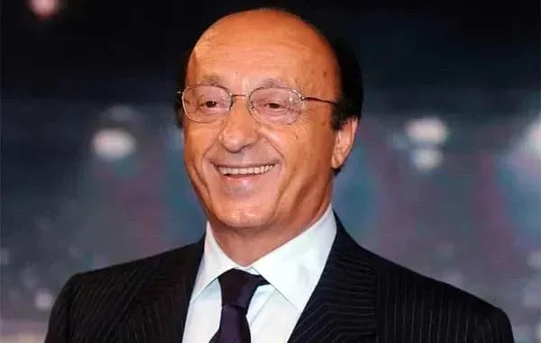 Smiling man in a suit at an event