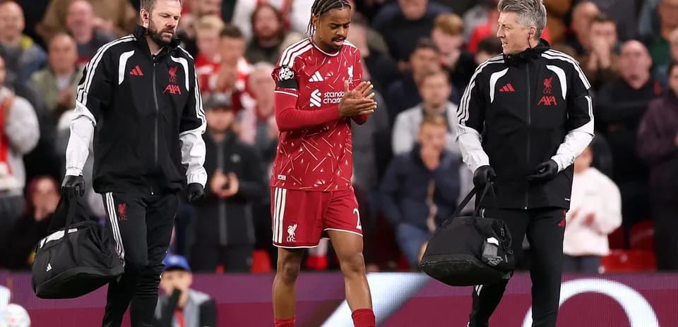 Liverpool player receiving medical attention on field